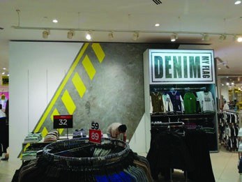 Denim store indoor branding installation