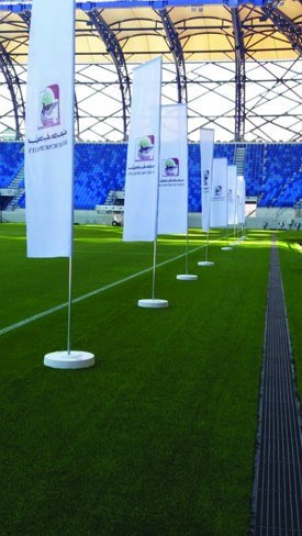 Printed advertising flags on an outdoor field